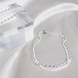 Strieborný náramok so zirkónom