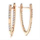 Náušnice s vloženými zirkónmi v ružovom zlate