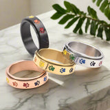 Otočný antistresový prsteň s dúhovými labkami